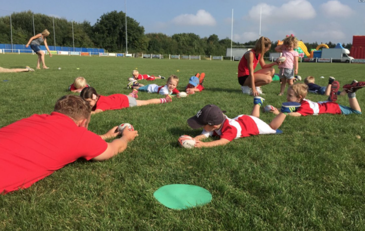 Children play at a didi rugby class