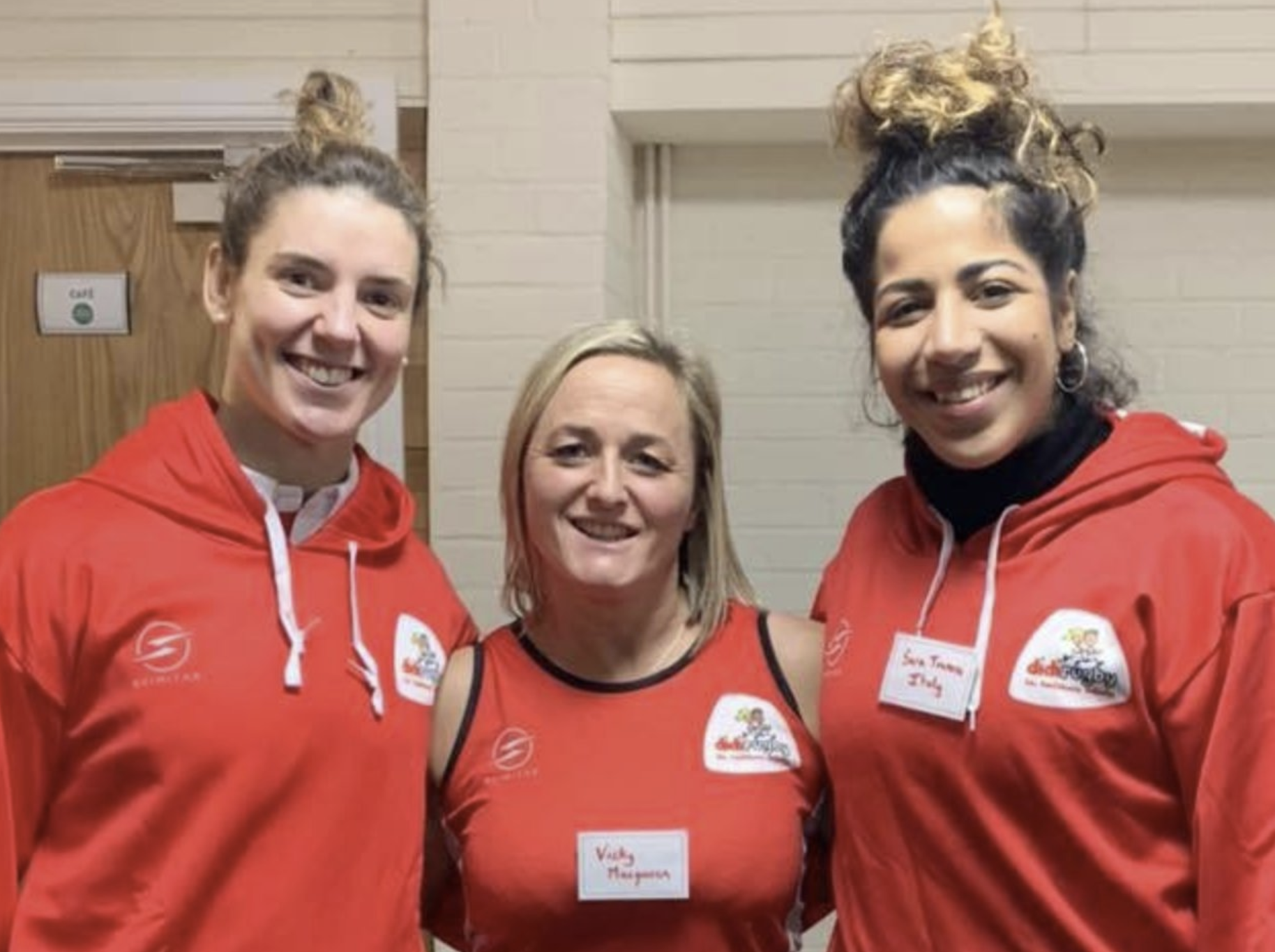 Sarah Hunter (left) stands with Vicky Macqueen and Italy international Sara Tounesi