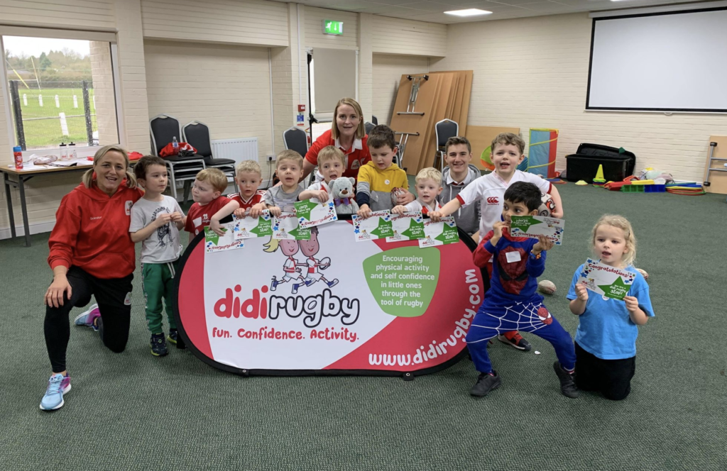 Birstall didi coach Jenny Burrows (centre) with a class of didi rugby children