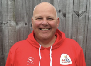 Mike Barnett wearing a didi rugby hoodie