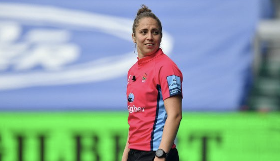 didi rugby ambassador Referee Sara Cox looks to one side and smiles