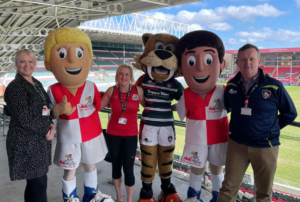 Leicester Tigers CEO Andrea Pinchen, didi rugby CEO Vicky Macqueen, Leicester Tigers Head of Community, Scott Clarke and the didi rugby and Leicester Tigers mascots